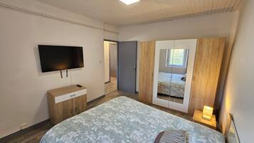 1 chambre, fer et planche Ă repasser, draps fournis