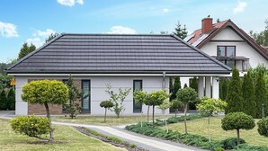 A modern two-story house with a grey roof, white exterior walls, and a covered porch. - Gorgeous home in Drogoradz (Drogoradz)