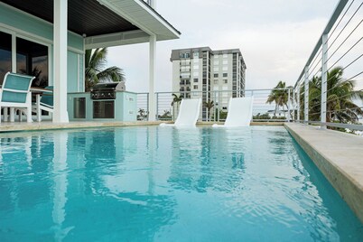 Beachfront 5-bedroom house on tranquil Ft Myers Beach w/ private pool, elevator