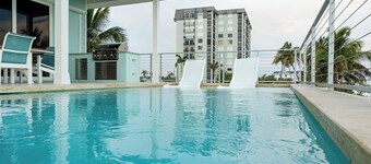 Beachfront 5-bedroom house on tranquil Ft Myers Beach w/ private pool, elevator