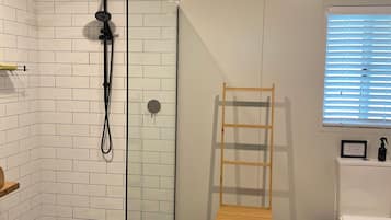 Shower, eco-friendly toiletries, hair dryer, towels