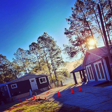 Exterior. Cozy Forest Retreat Mid-Century Charm Fireplace 20 Min to Disney
