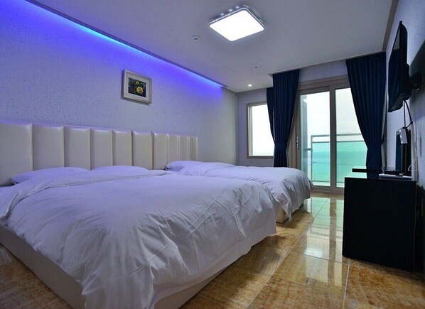 Suite familiar, vistes a l'oceà | Roba de llit d'alta qualitat, cobrellits i cortines opaques