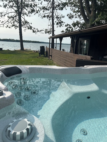 3b 2ba +loft Lakefront escape with level lot and hot tub!  Pontoon available