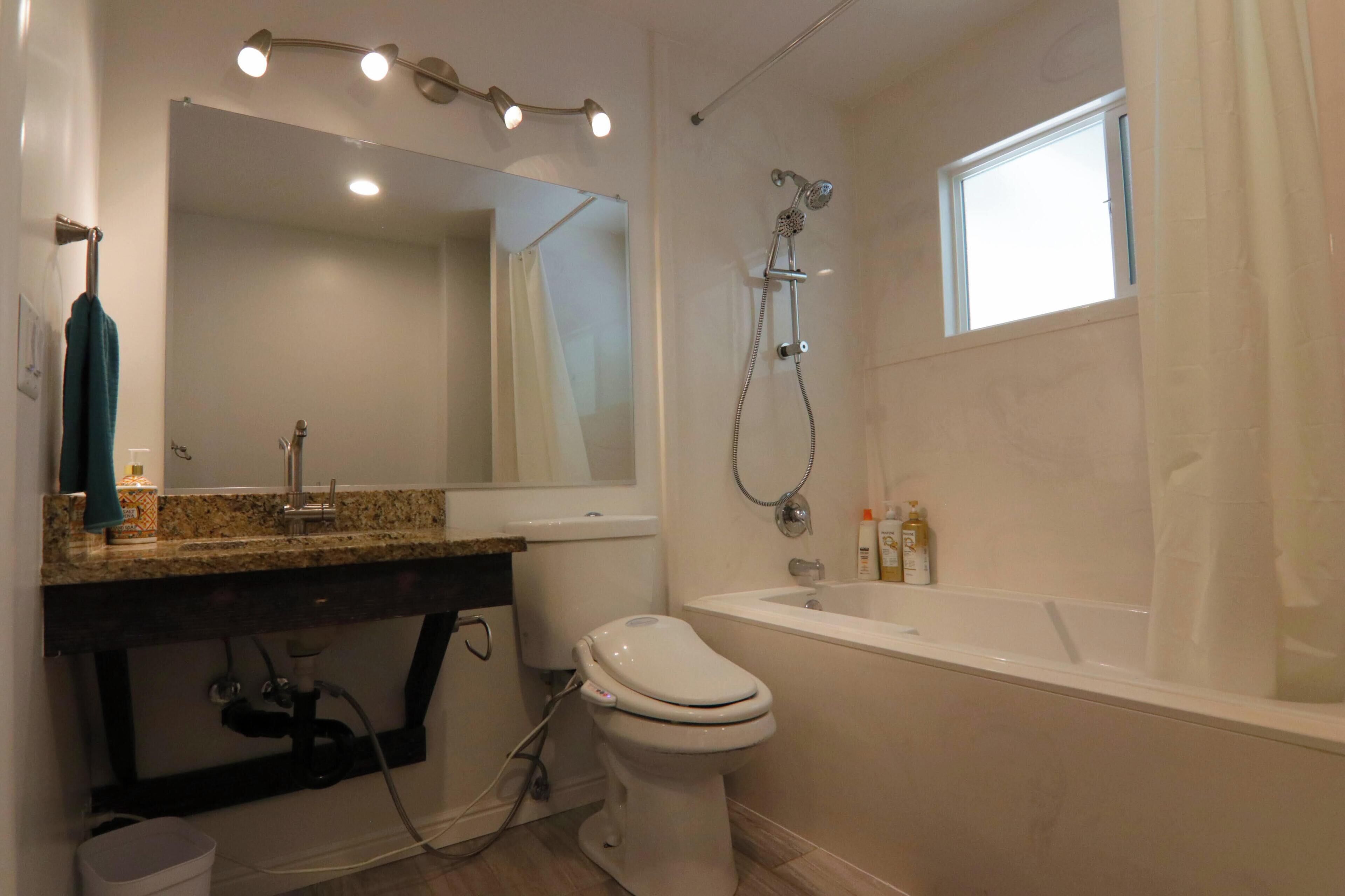 Jetted tub, hair dryer, towels, soap