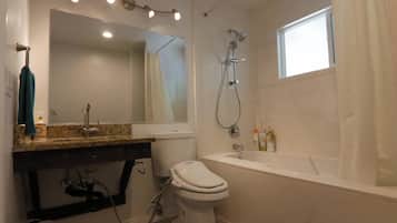 Jetted tub, hair dryer, towels, soap