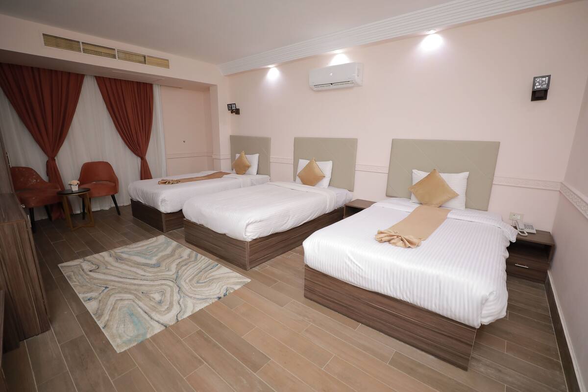 Deluxe Triple Room | Premium bedding, pillowtop beds, minibar (free items), in-room safe