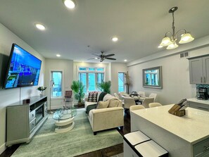 Smart TV, fireplace, books, stereo