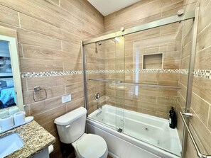 Hair dryer, towels, soap, shampoo