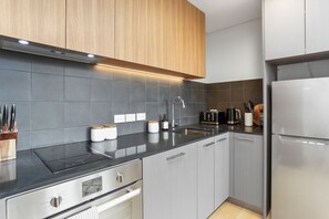 Lägenhet - 1 sovrum | Eget kök | Stort kylskåp, mikrovågsugn, ugn och spishäll