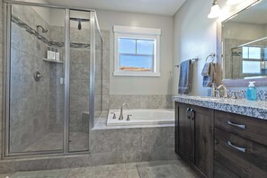 Shower, hair dryer, towels, shampoo