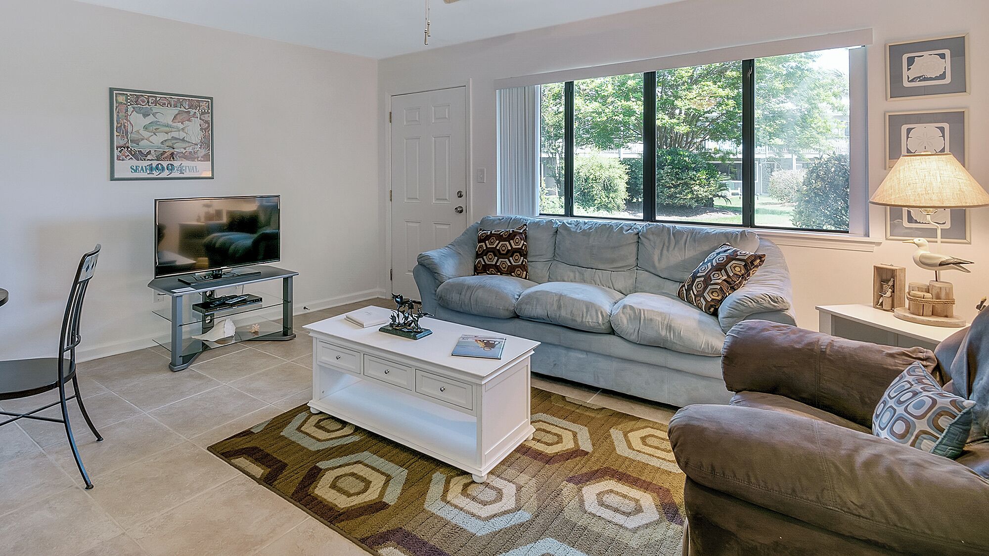 Studio Suite, 1 Queen Bed with Sofa bed, Patio, Garden View (Hidden Beach 117) | Living area | 42-inch flat-screen TV with digital channels