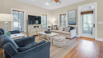 House, Multiple Beds, Patio, Garden View (By The Wave) | Living area | 50-inch flat-screen TV with digital channels