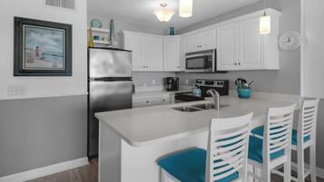 Condo, Multiple Beds, Balcony, Ocean View (Mistral 11) | Private kitchen | Fridge, microwave, oven, stovetop