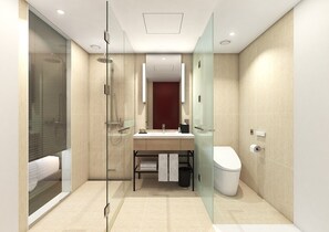 Een douche, een haardroger, pantoffels, een bidet