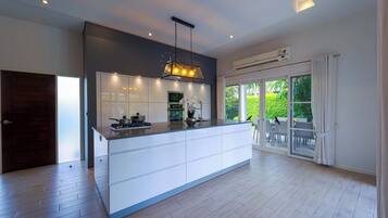 Exclusive Villa, Balcony, Pool View | Private kitchen
