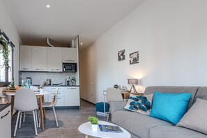 Family Studio (Always Traveling Near The City Center) | Living area | 21-inch flat-screen TV with cable channels, TV - Always Traveling Near The City Center (Olbia)