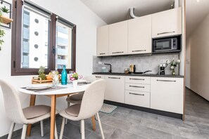 Family Studio, Balcony (Always Traveling Near The City Center) | Private kitchen | Fridge, microwave, stovetop, dishwasher - Always Traveling Near The City Center (Olbia)