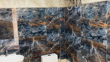 Shower, rainfall showerhead, towels, soap