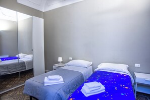 2 habitaciones y ropa de cama