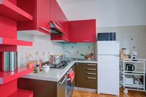 Family Apartment, Multiple Bedrooms (Serendipity Spiaggia E Porto Sole) | Private kitchen | Fridge, microwave, oven, stovetop - Serendipity Spiaggia E Porto Sole (Sanremo)