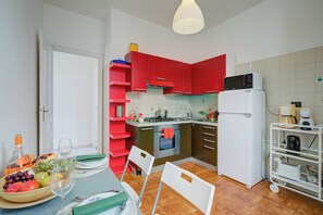 Family Apartment, Multiple Bedrooms (Serendipity Spiaggia E Porto Sole) | Private kitchen | Fridge, microwave, oven, stovetop - Serendipity Spiaggia E Porto Sole (Sanremo)