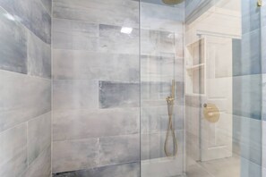 Shower, hair dryer, soap, shampoo