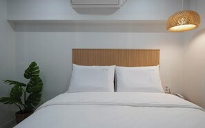 Habitación Deluxe doble, vistas a la ciudad | Ropa de cama de alta calidad y edredones de plumas