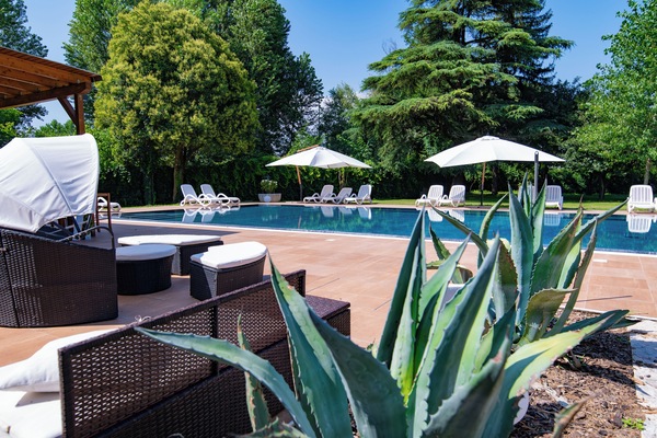 Seasonal outdoor pool, open 10:00 AM to 7:00 PM, sun loungers