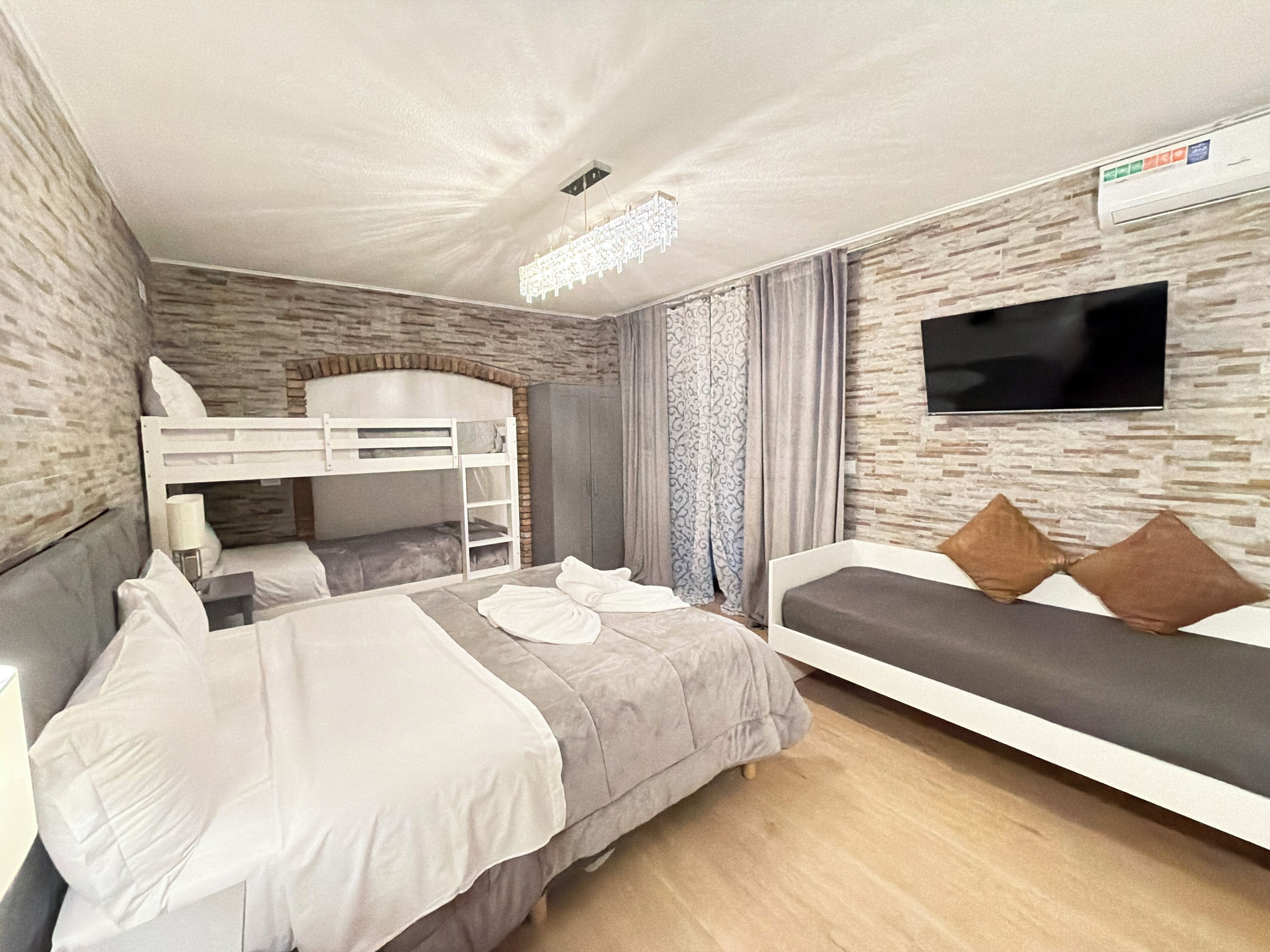 Deluxe Apartment, Kitchen | Down comforters, minibar, in-room safe, desk