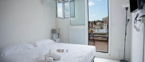 Appartement familial, plusieurs chambres (Sea View Historic Center) | 1 chambre, fer et planche Ă repasser, literie fournie