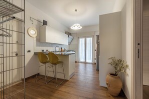 Apartment | Private kitchen | Fridge, oven, stovetop, dishwasher