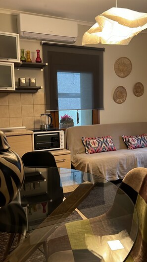 Chambre, 1 chambre, vue jardin | Coin séjour