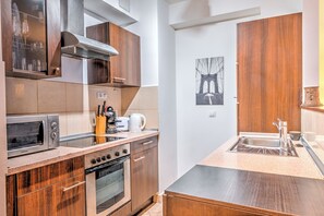 Superior Apartment, Balcony | Private kitchen | Full-size fridge, microwave, oven, stovetop - Central Capital Apartments (Budapest)