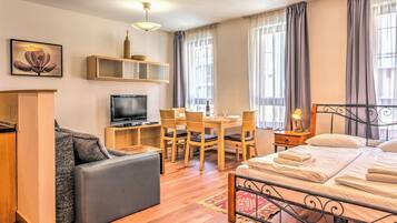 Appartement Standard | Coin séjour | Télévision à écran plat