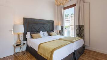 Down comforters, blackout drapes, iron/ironing board, WiFi (free)