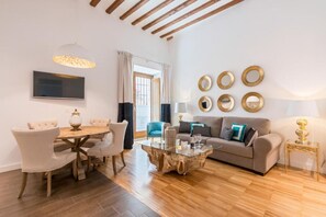 Standard Apartment, 1 Bedroom | Living area | Flat-screen TV