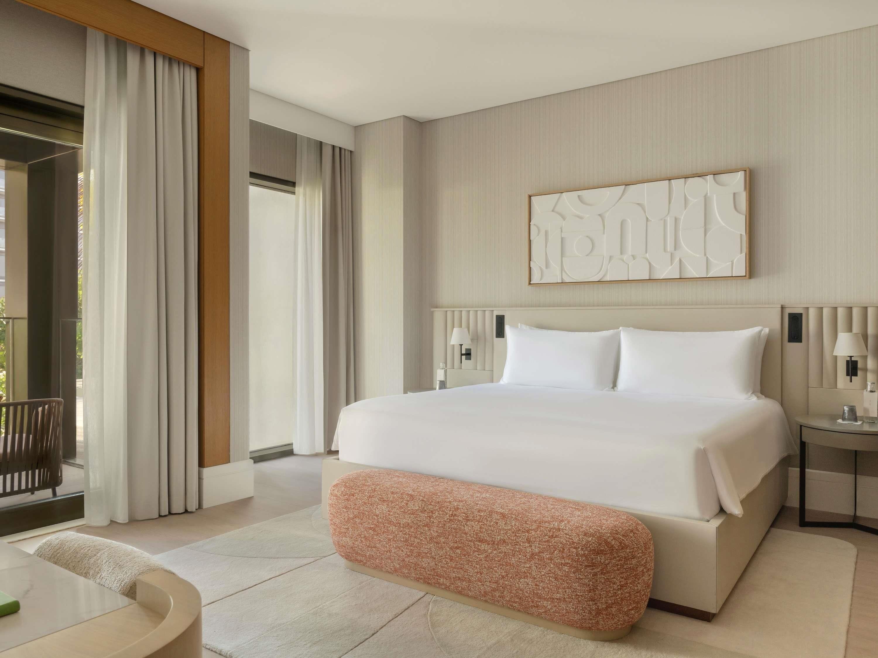 Premium bedding, down duvets, minibar, in-room safe