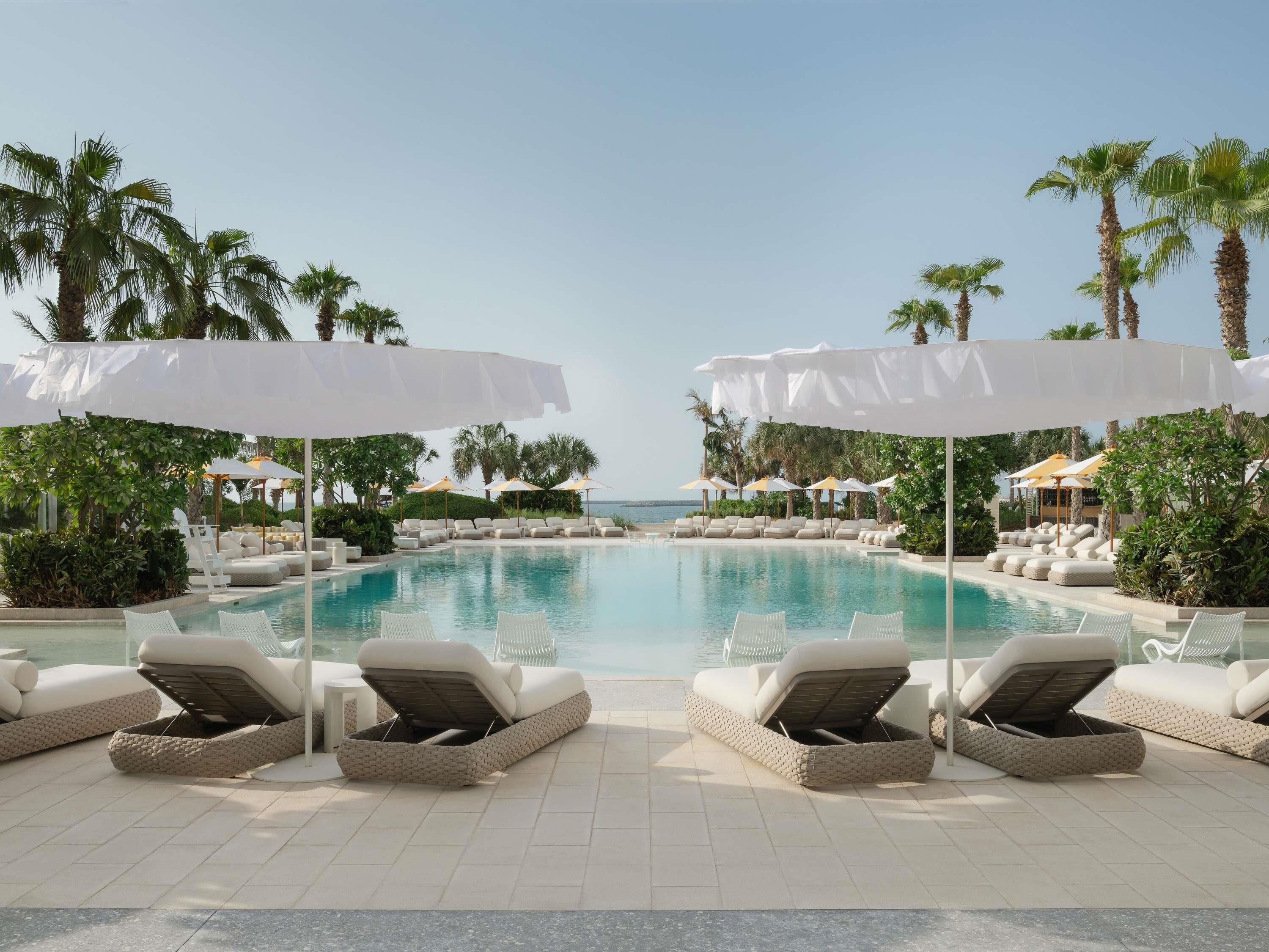 Outdoor pool, open 8:00 AM to 7:00 PM, cabanas (surcharge)