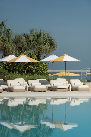 Outdoor pool, open 8:00 AM to 7:00 PM, pool cabanas (surcharge)
