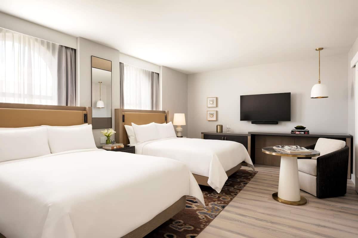 Hypo-allergenic bedding, desk, laptop workspace, free cribs/infant beds