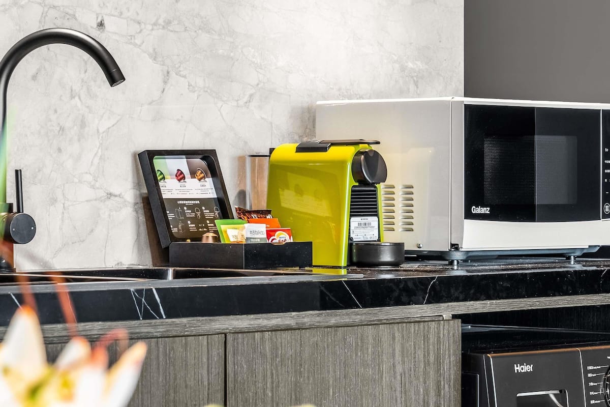 Suite Deluxe, 2 lits jumeaux | Articles de minibar gratuits, rideaux dâobscurcissement