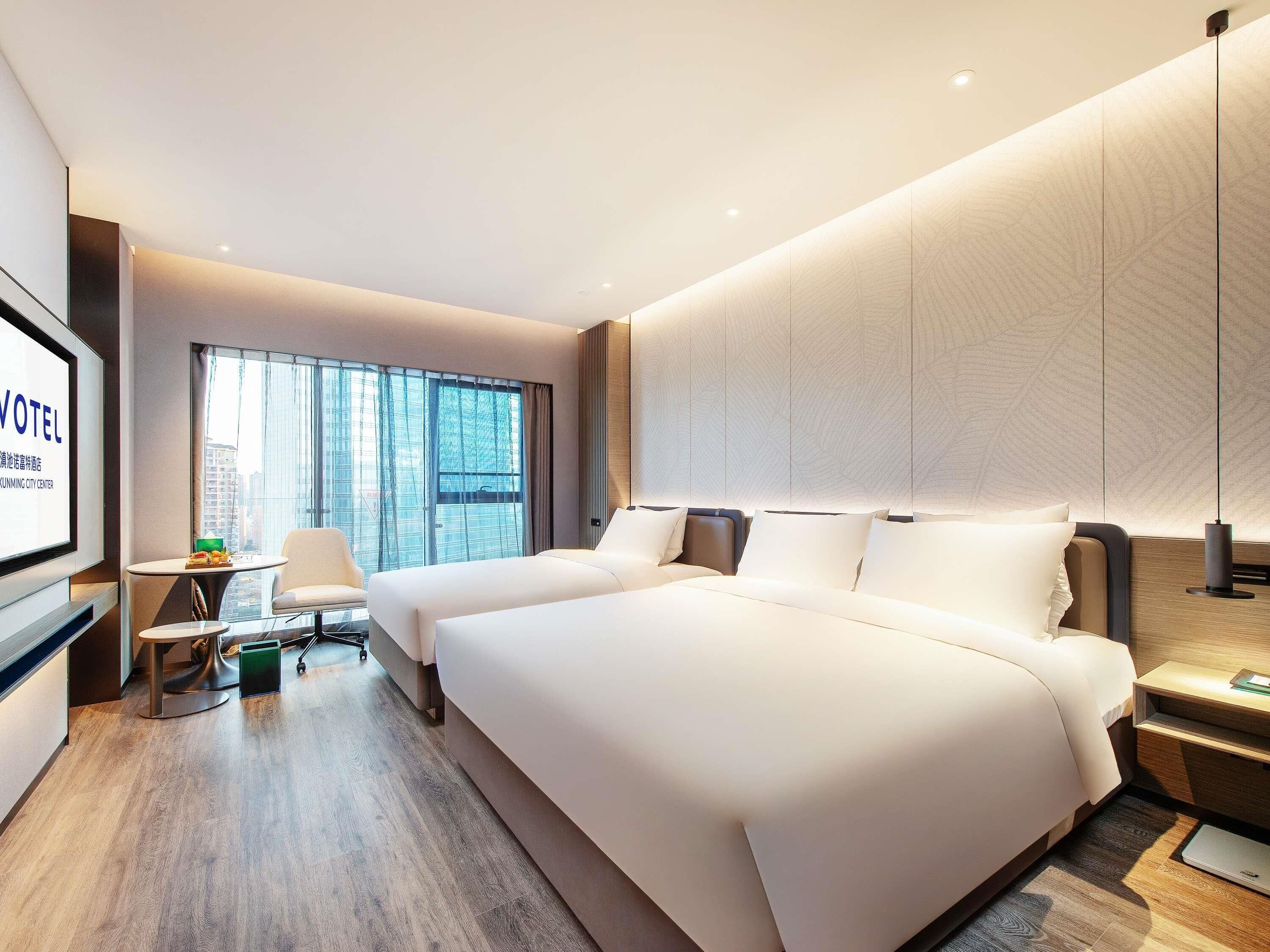 Family Room, 2 Double Beds | Free minibar, blackout drapes, rollaway beds, free WiFi