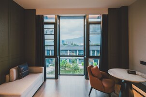 Premium bedding, down comforters, free minibar items, in-room safe