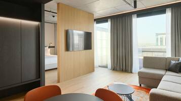 Premium bedding, down comforters, memory foam beds, minibar