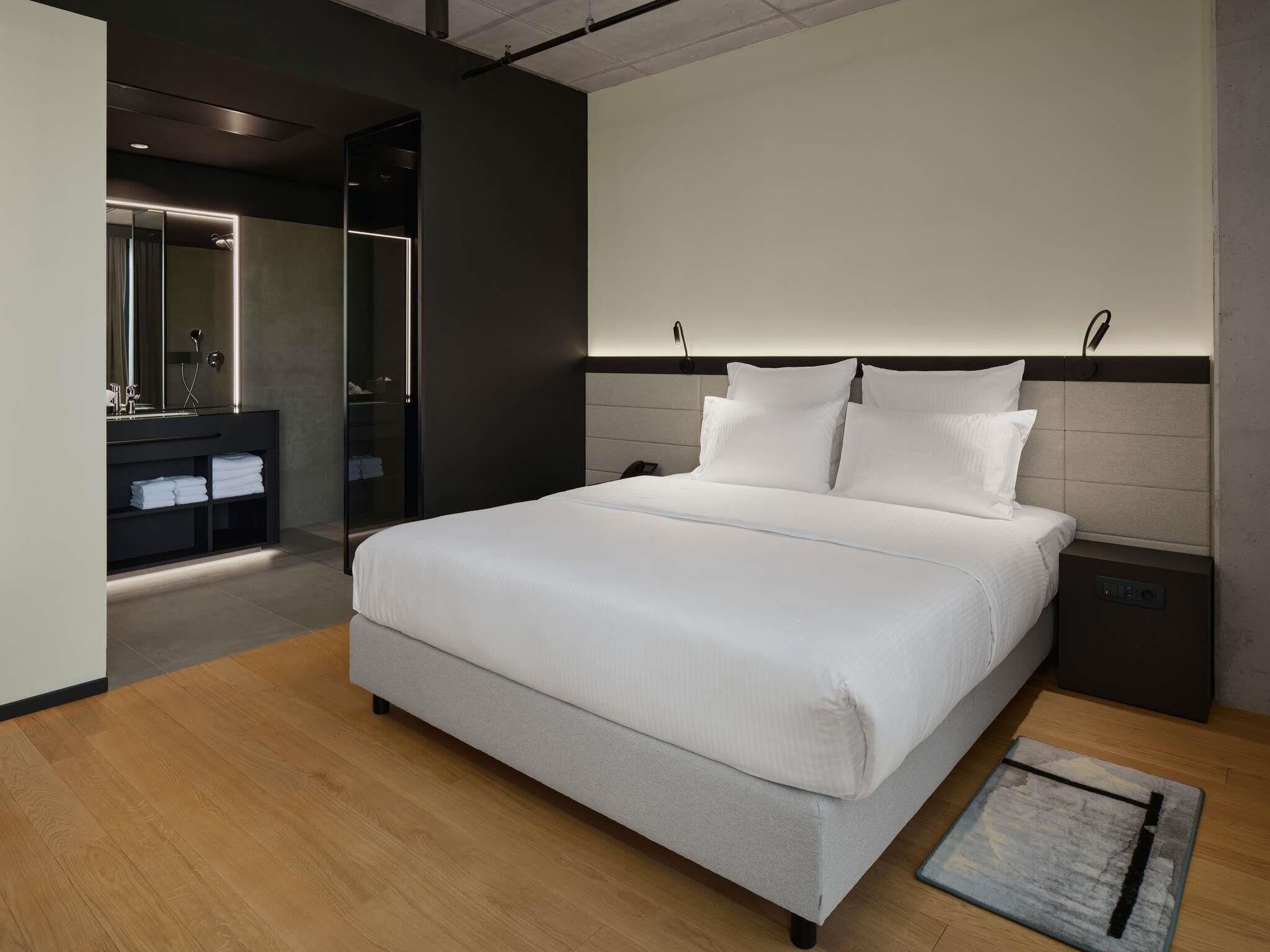 Suite Junior, 1 très grand lit et 1 canapé-lit | Literie de qualité supérieure, couette en duvet d'oie