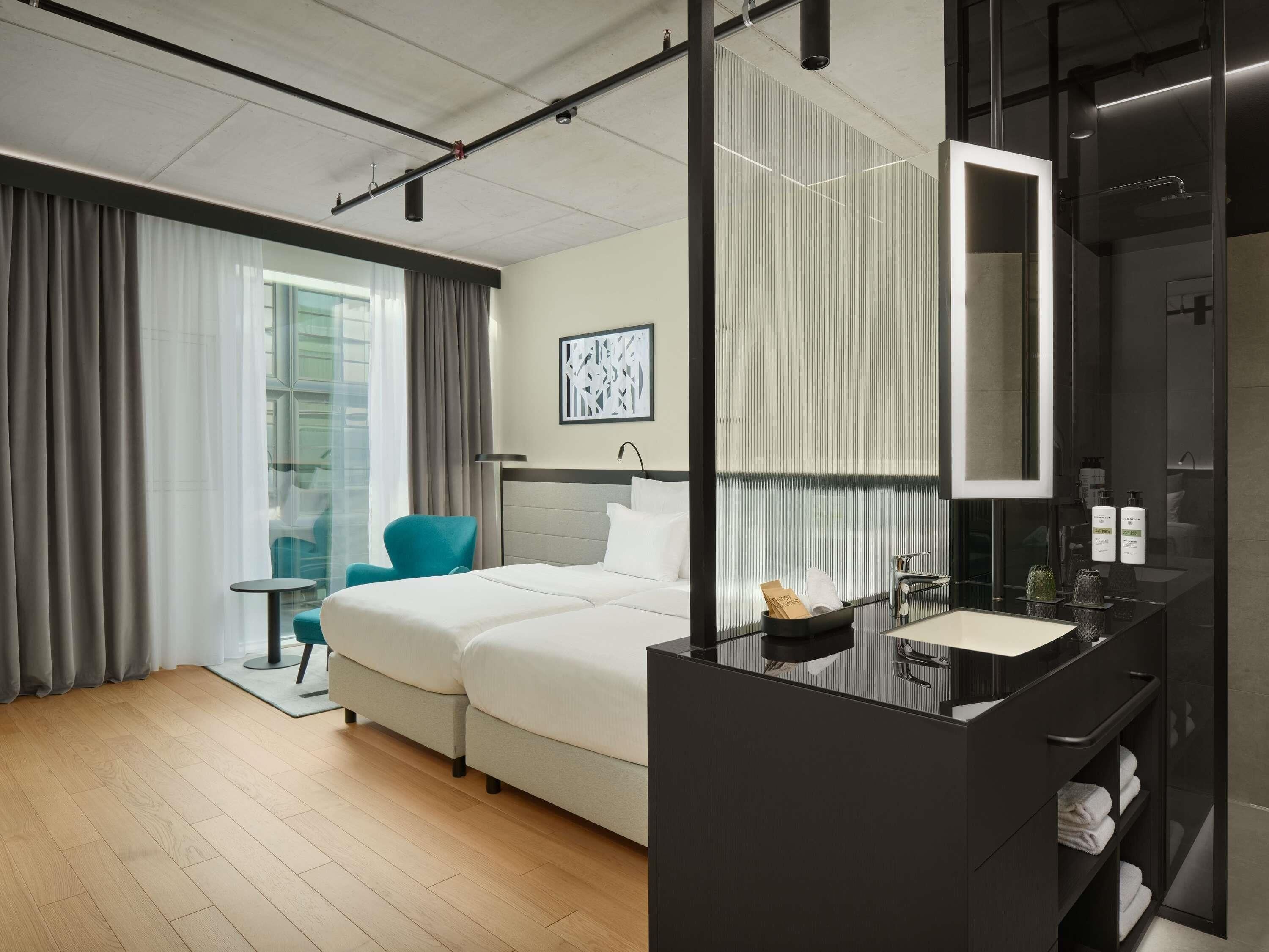 Premium bedding, down comforters, memory foam beds, minibar