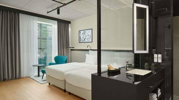Premium bedding, down duvets, memory-foam beds, minibar