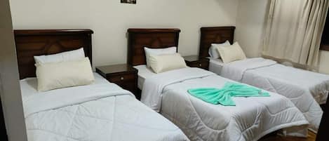 Family Triple Room, Balcony, City View | Blackout drapes, soundproofing, free WiFi