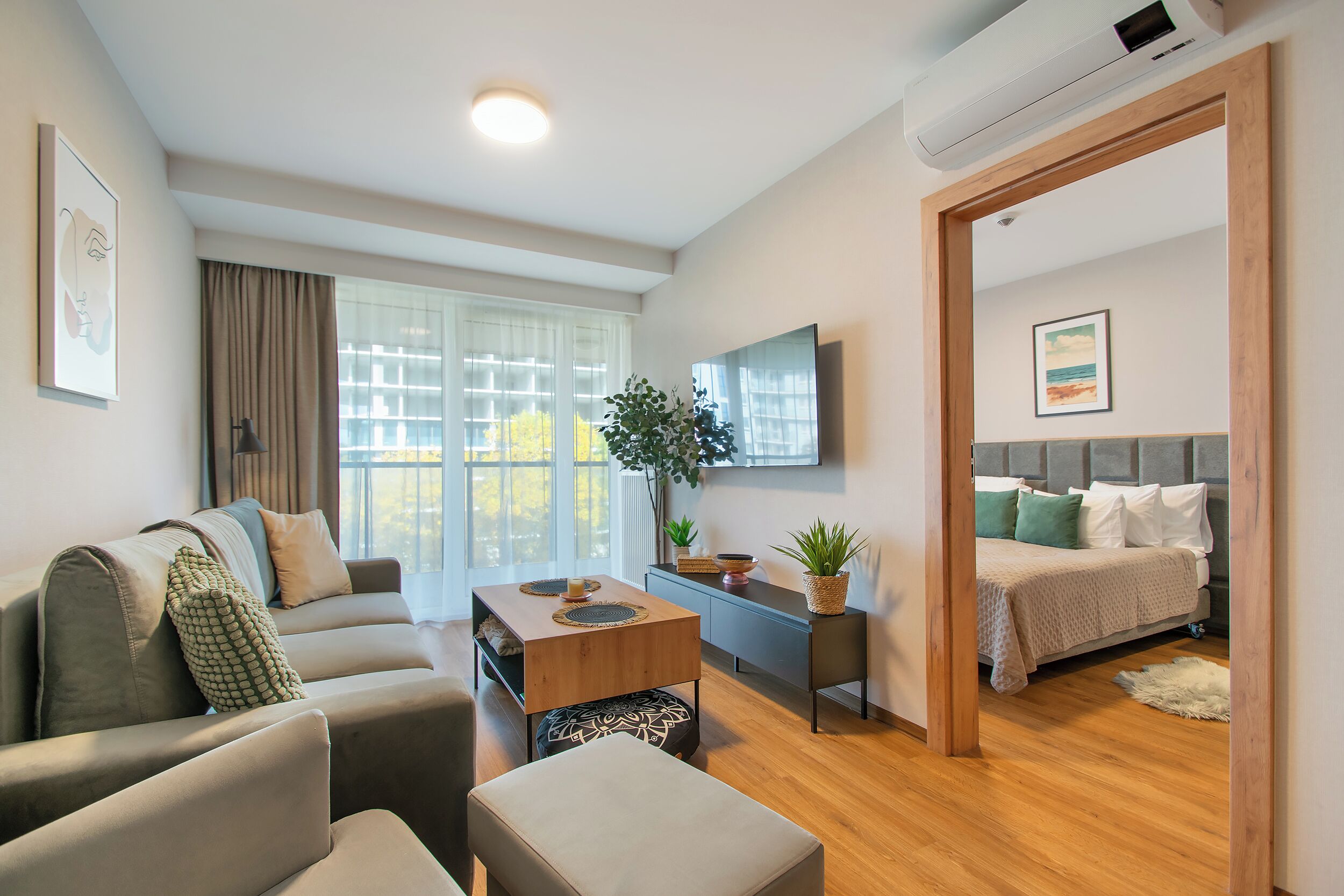 Comfort Apartment | Living area | 27-inch flat-screen TV with digital channels